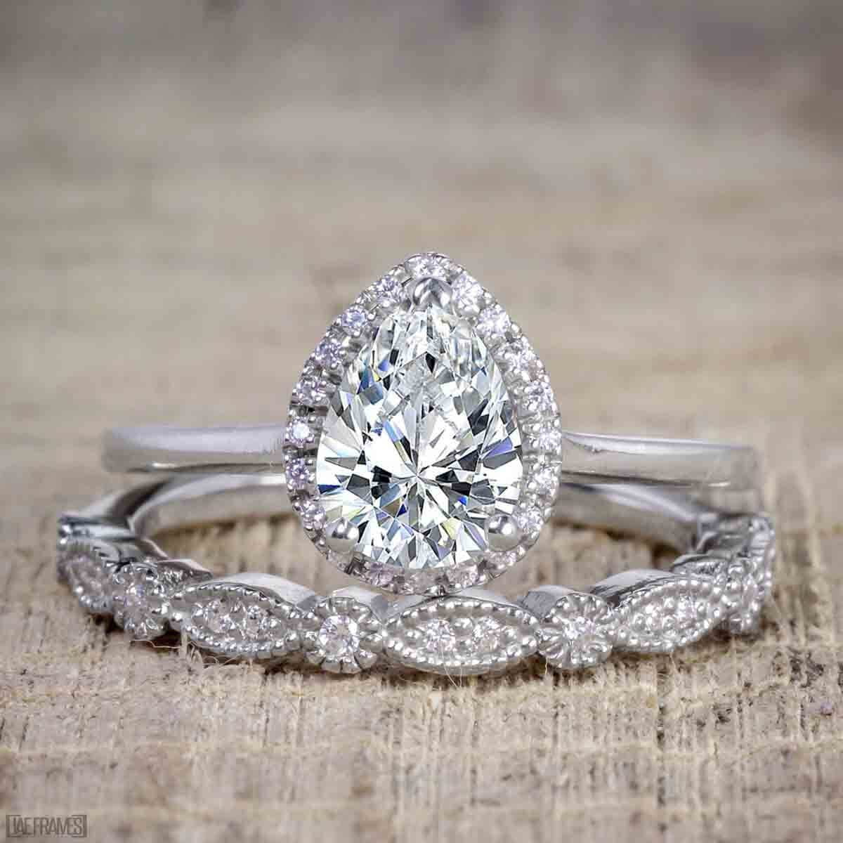Pear Cut Moissanite and Diamond Halo Wedding Ring Set in White Gold B54816